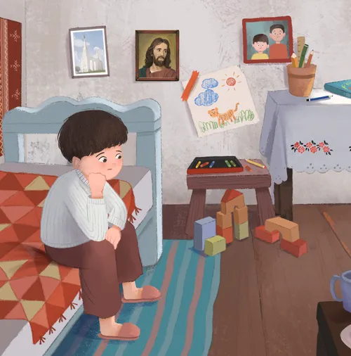 Patrik sitting on his bed