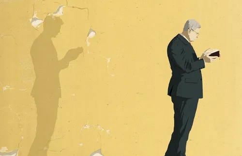 man standing with scriptures