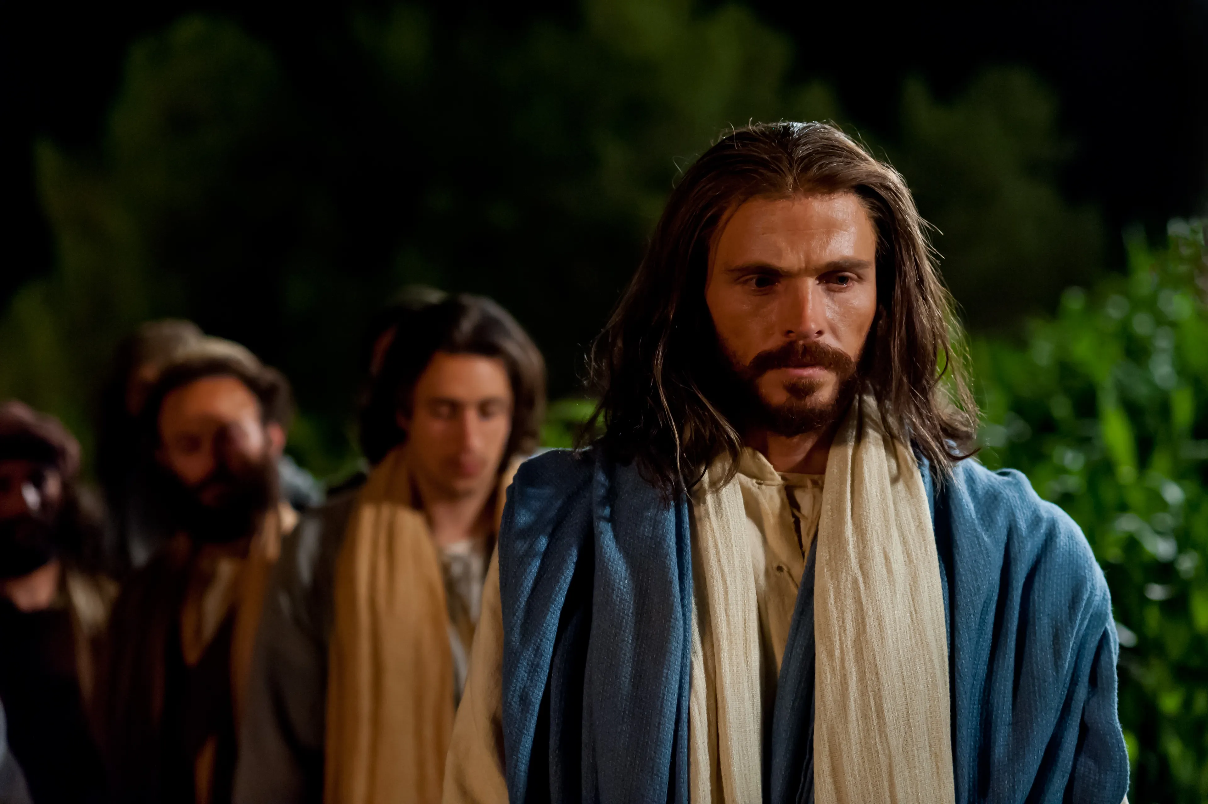 Christ and His Apostles approach the Garden of Gethsemane.