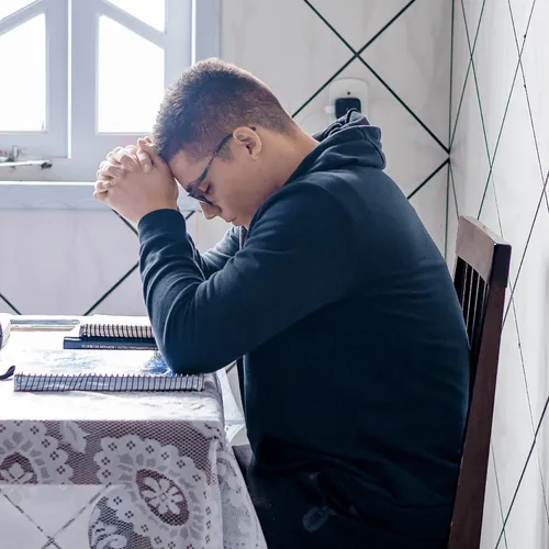 young man praying