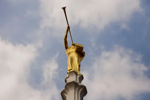 A close-up view from a low angle of the angel Moroni statue on the Mexico City Mexico Temple spire.