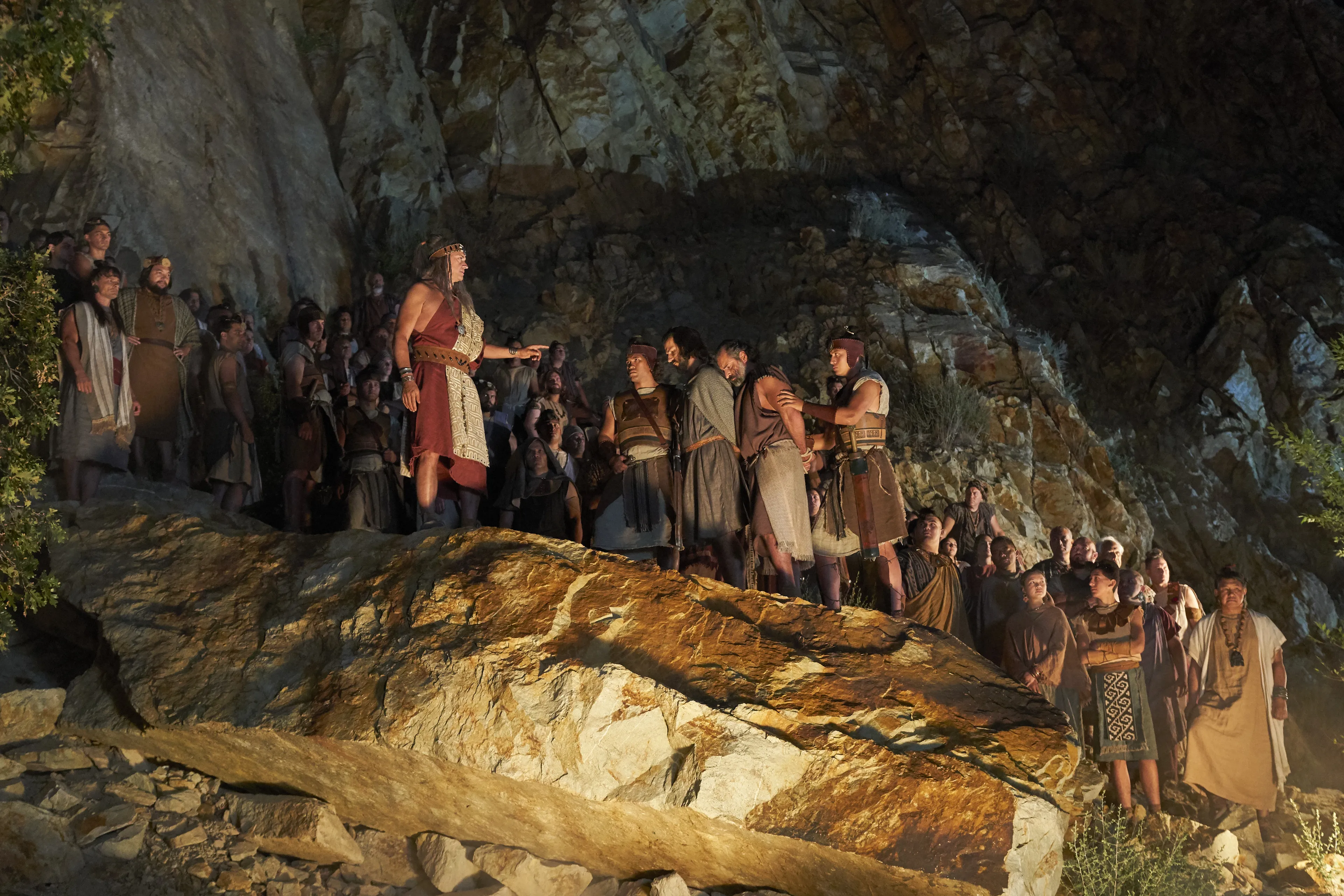 Alma the Younger and Amulek are led away from the fire that has consumed the believers in Ammonihah.