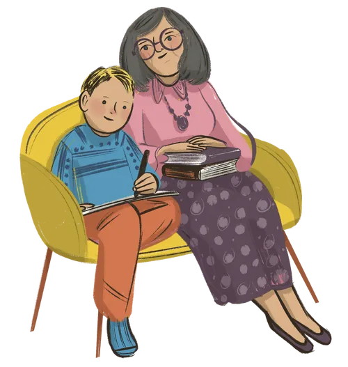 Boy sitting with elderly woman and writing