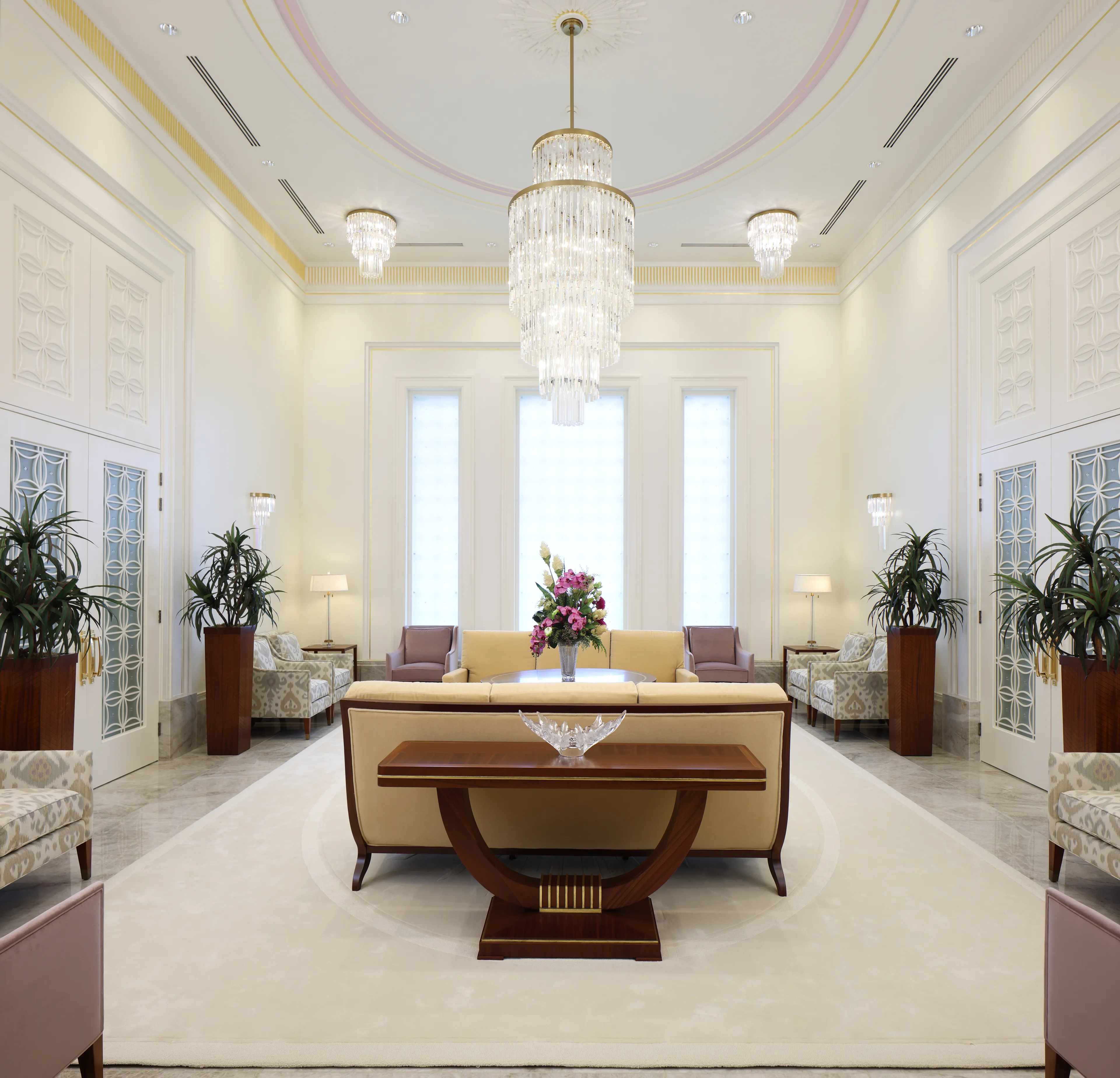 Interior image of the Abidjan Ivory Coast Temple featuring the Celestial Room. The image highlights the room as a whole. We see furniture around the room and the chandelier hanging from the ceiling. © undefined ipCode 1.