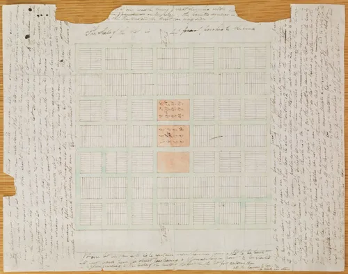 Map on torn paper showing the grid of a city