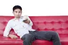 Man sitting on couch