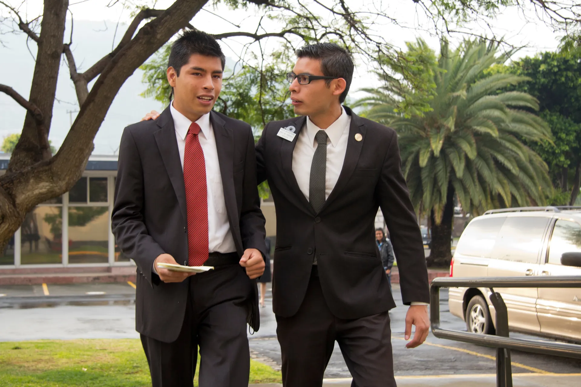 An elder missionary welcoming another elder missionary to the Mexico MTC.