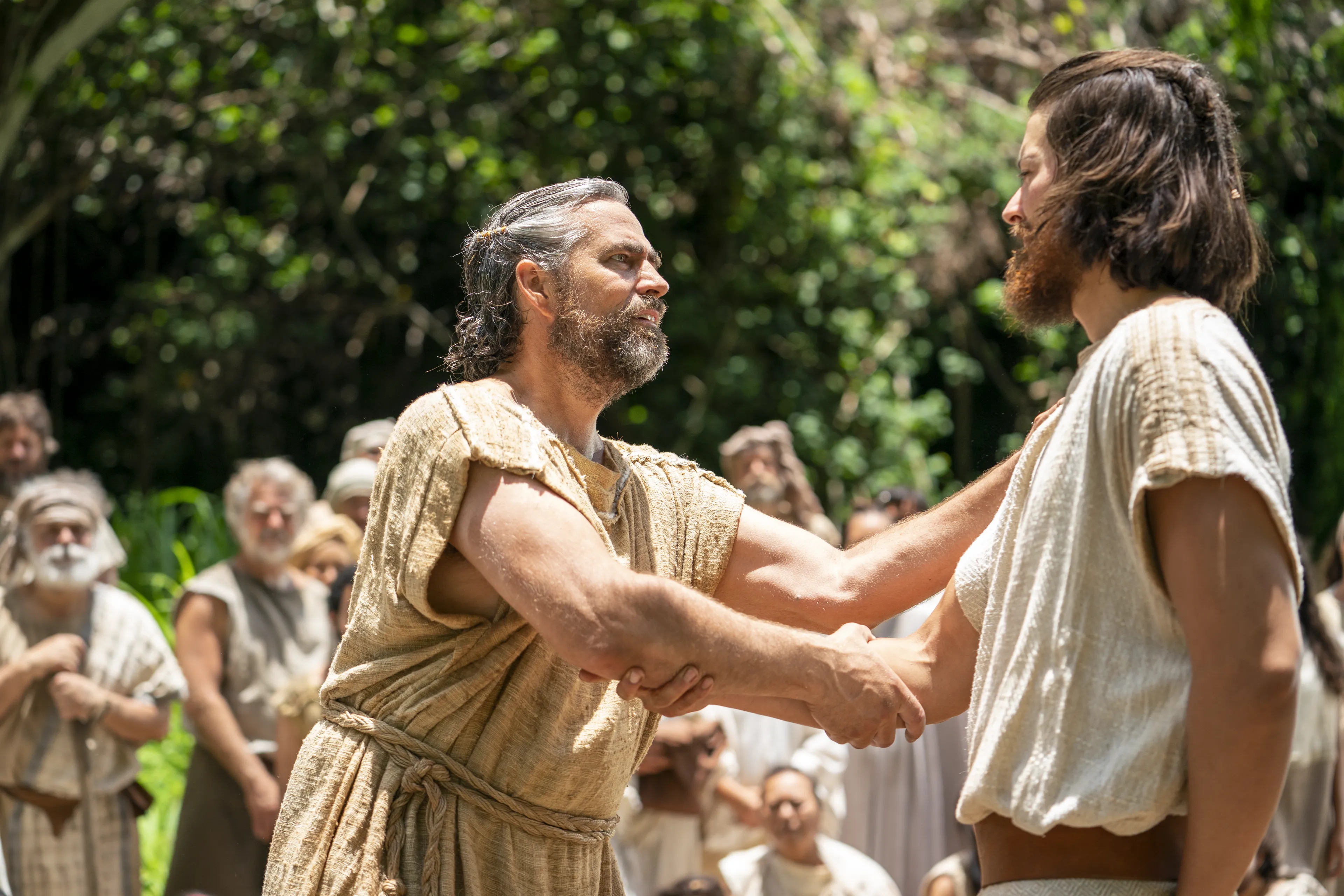 People prepare themselves to be baptized at the Waters of Mormon. They listen to Alma teach and testify.