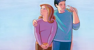 girl walking with boy who is drinking