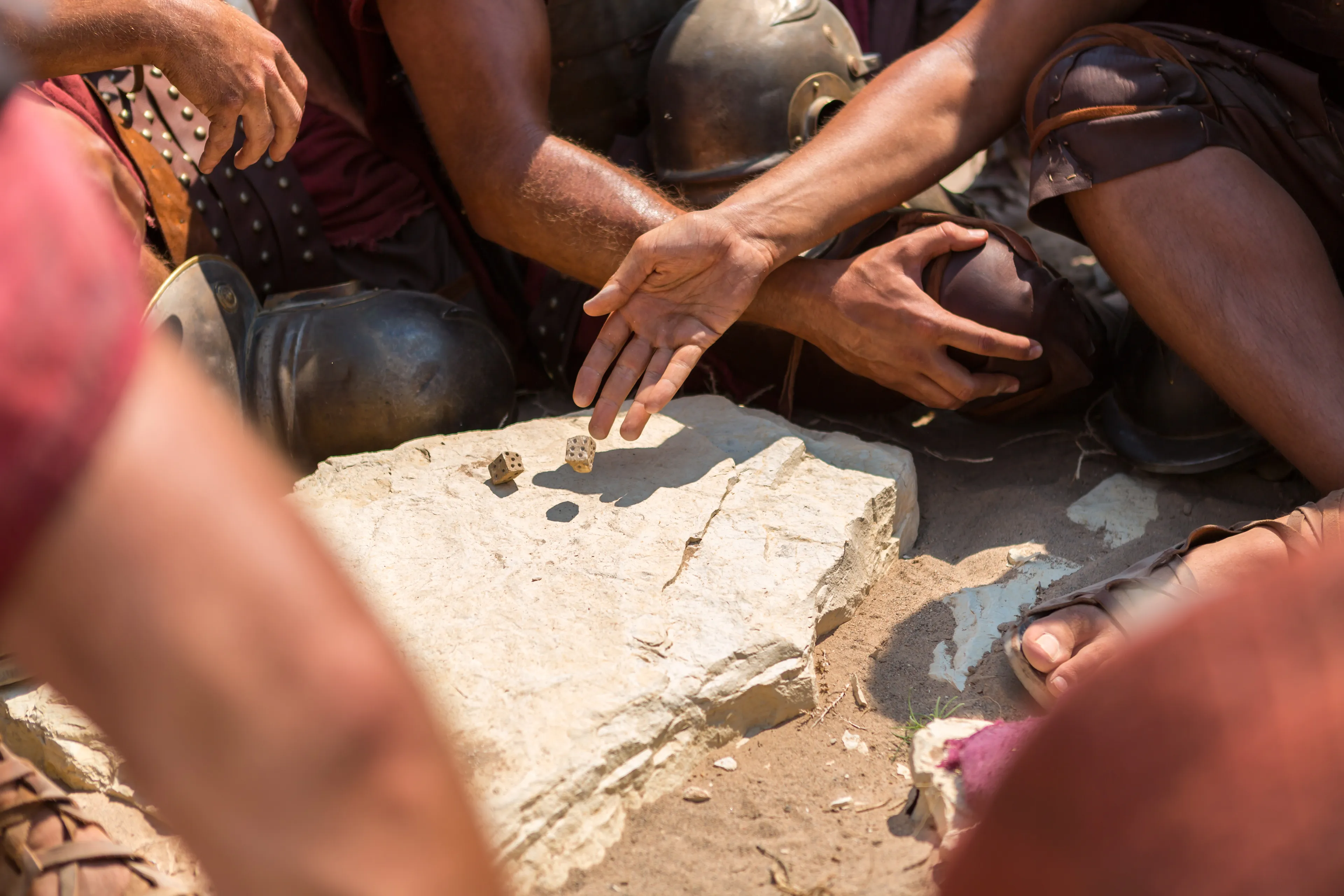 A detail of Roman soldiers gambling for Christ’s clothing and belongings.