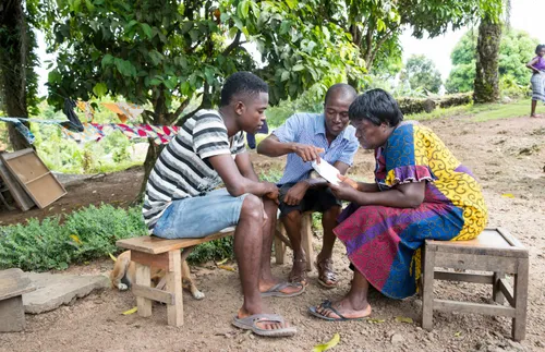 family looking at scriptures together
