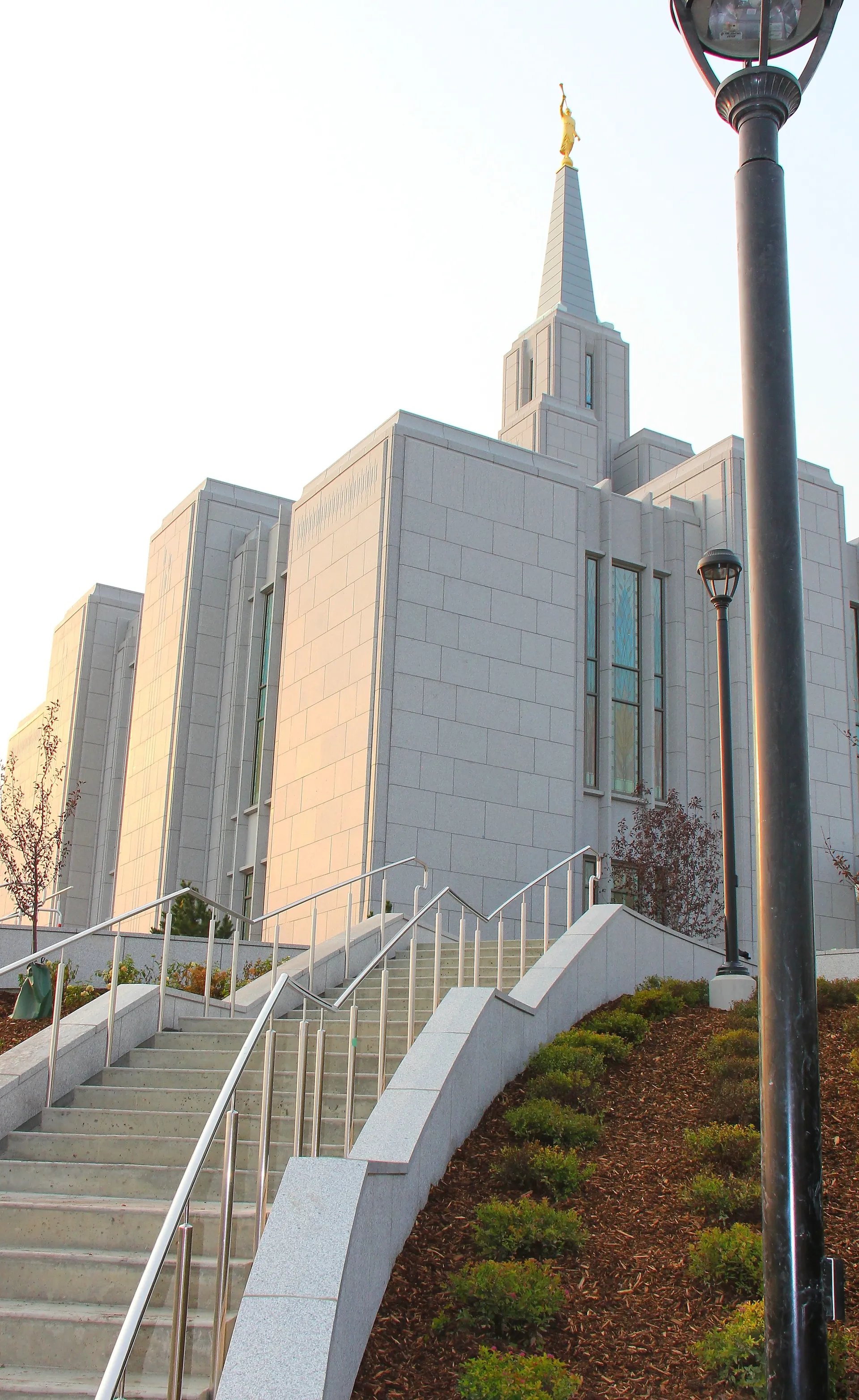 Stairs ascend from the temple grounds and lead to the entrance of the Calgary Alberta Temple.