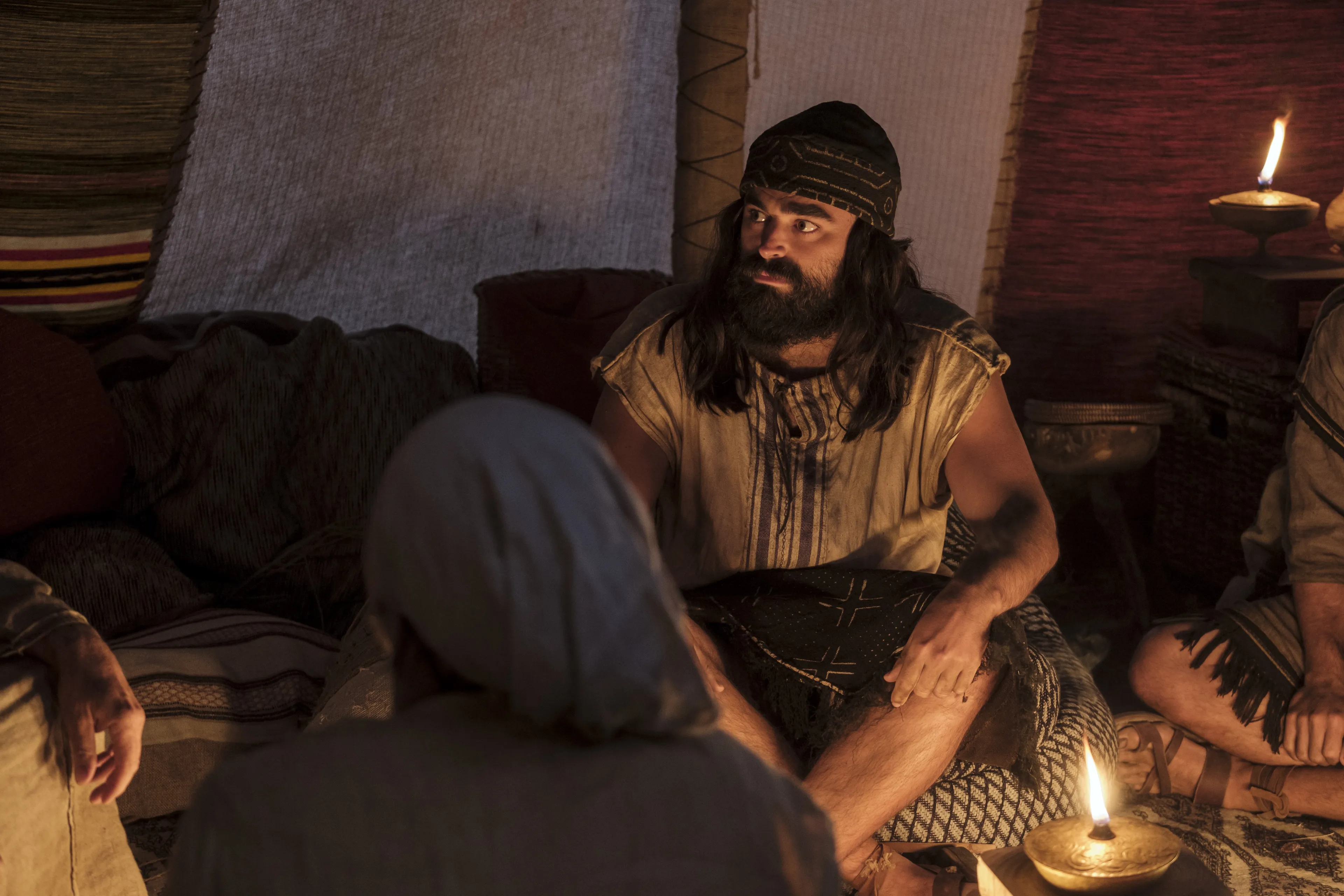 Laman listens as Lehi talks about his vision of the tree of life.