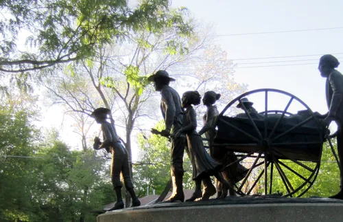 handcart pioneer sculpture