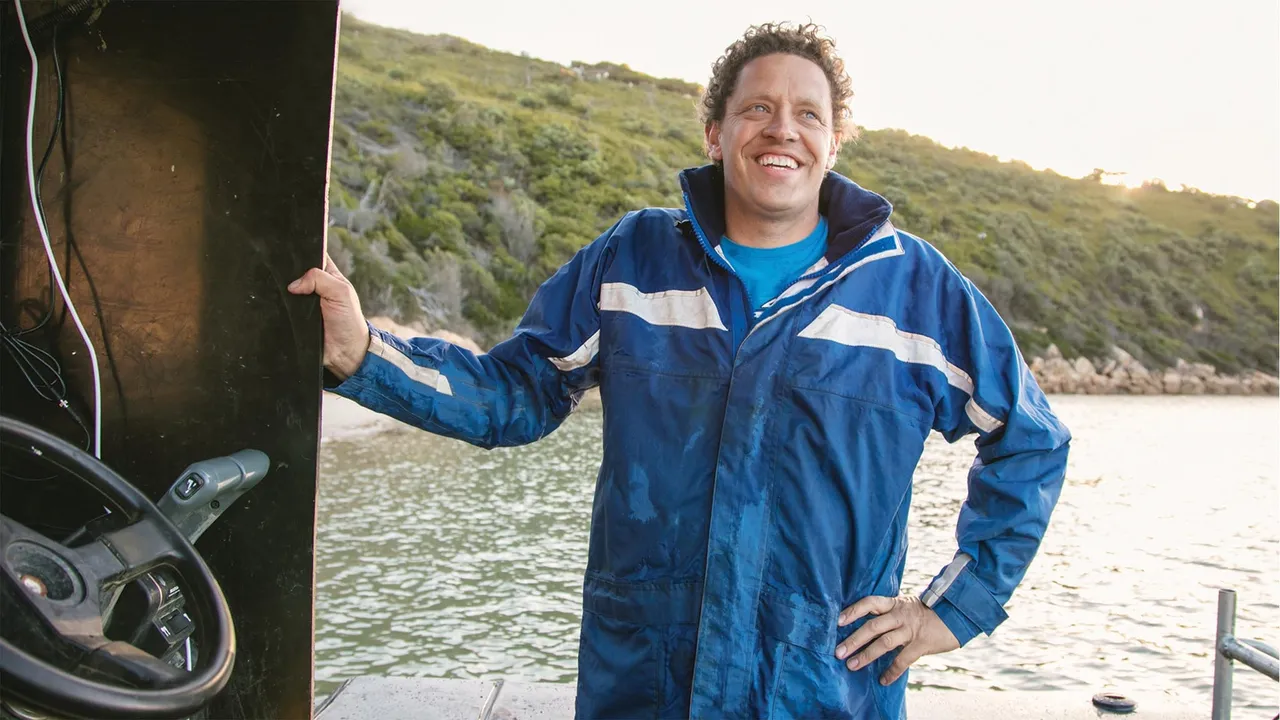 Grant on a boat gazes out to see and explains how the Book of Mormon helps his life