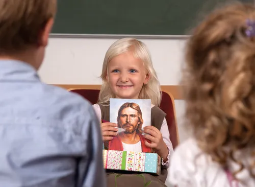 child opening a gift