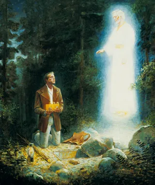 Joseph Smith kneeling and holding the gold plates in his hands. He is looking up at the angel Moroni who stands in the air above him. Moroni is dressed in white. A square hole is in the ground in front of Joseph Smith.
