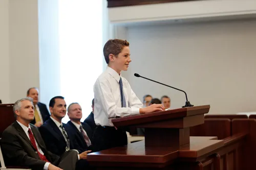 young man speaking in church