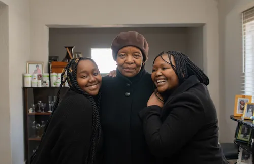 a woman with her niece and grandniece