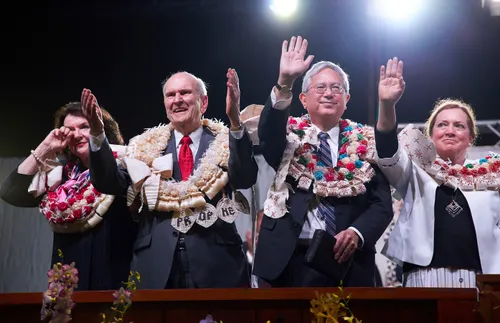 President Nelson and others waving