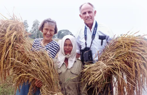 senior missionary couple with native in Laos