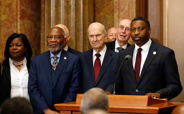 NAACP president Derrick Johnson speaks with President Russell M. Nelson of The Church of Jesus Christ of Latter-day Saints, at left, during a press conference in Salt Lake City on Thursday, May 17, 2018.