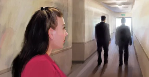 woman watching two men walking away