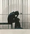 man behind bars