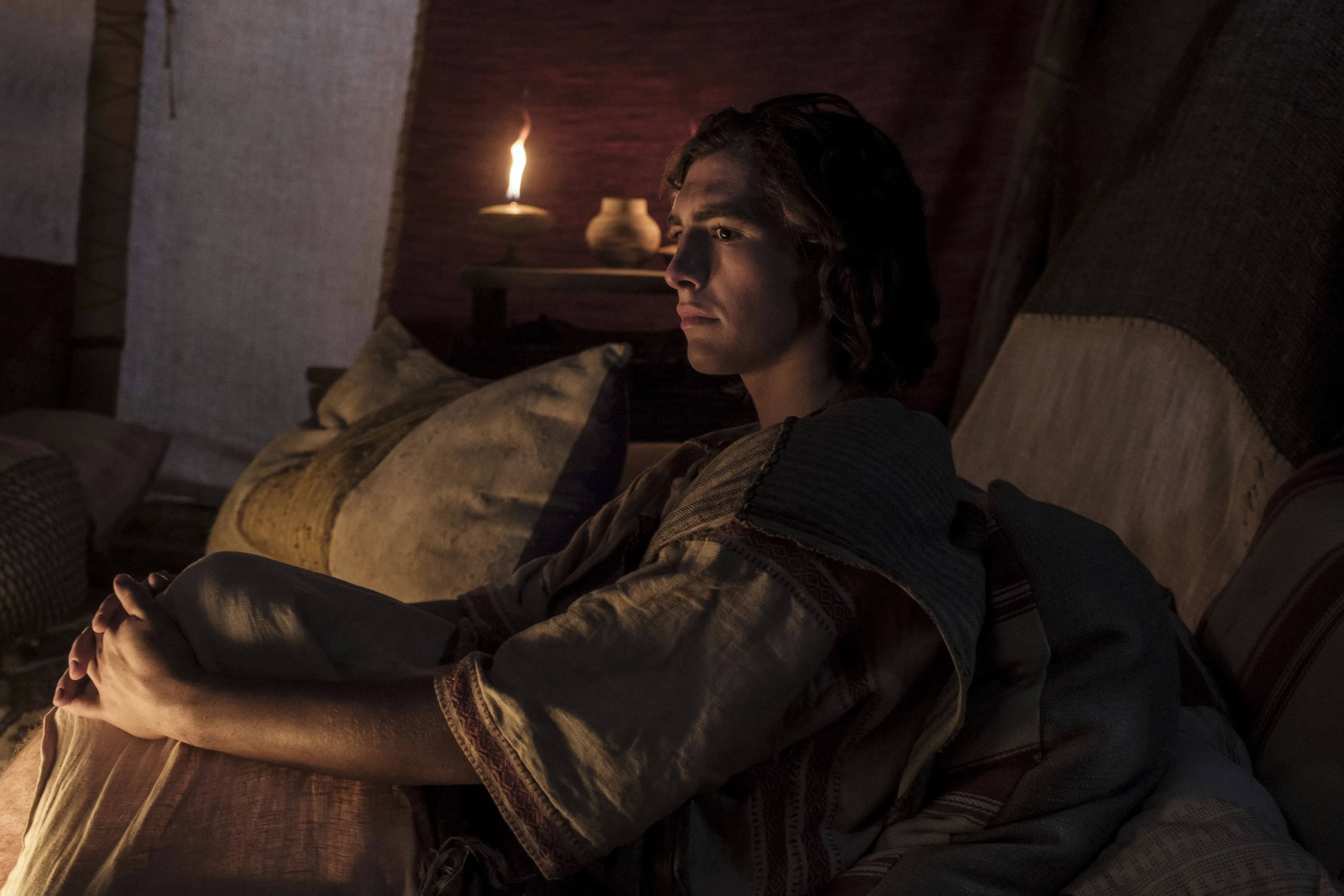 Nephi listens to Lehi speak about Lehi's vision of the tree of life.