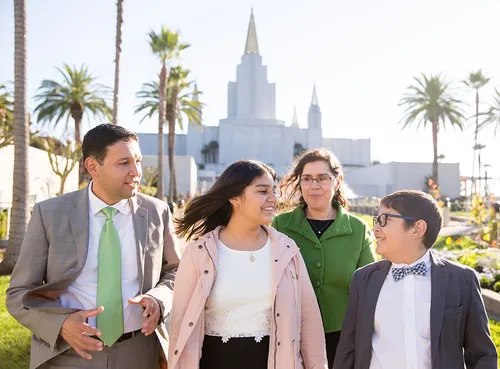 family in front of temple