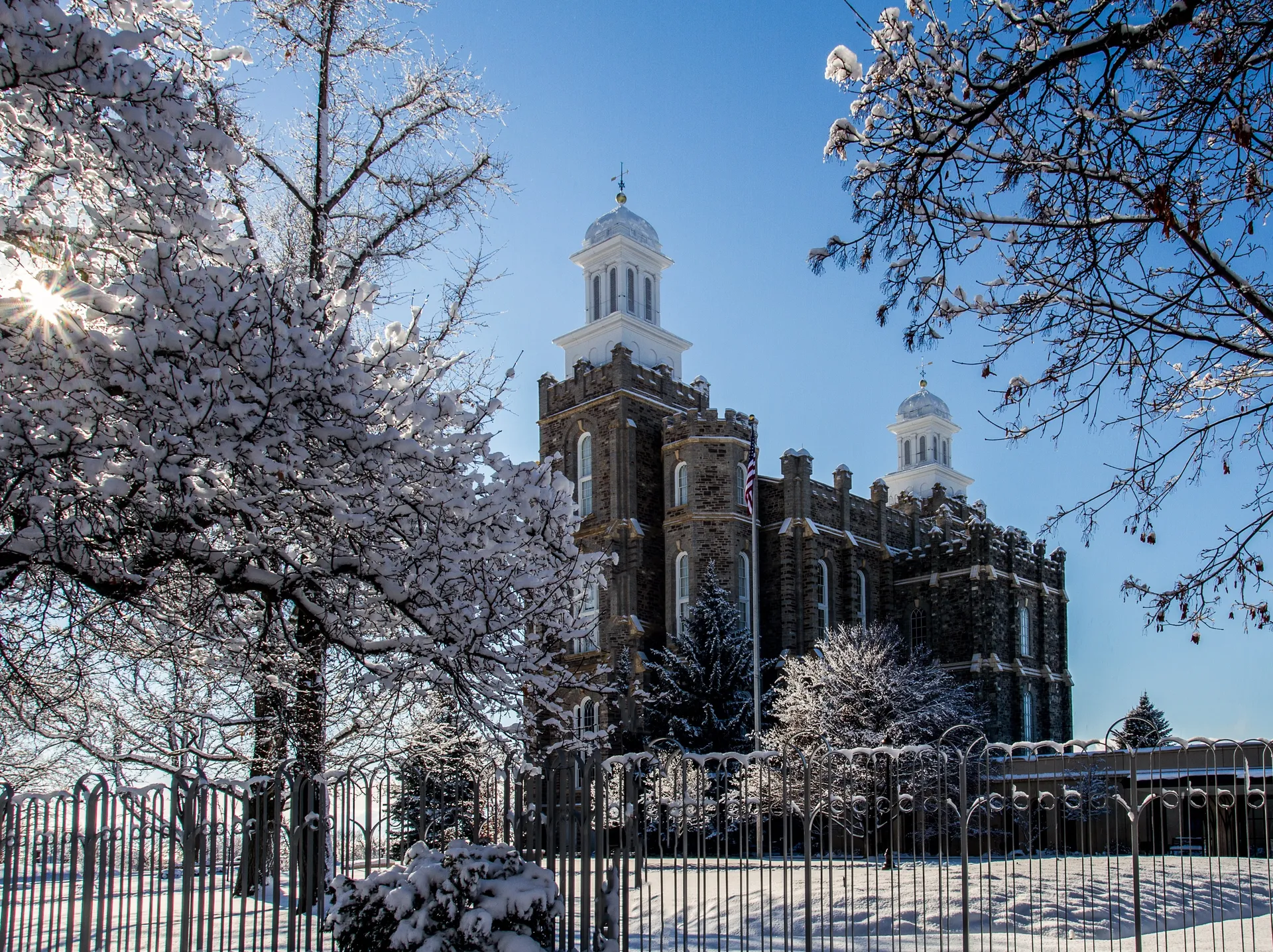 The Logan Utah Temple in the winter, including scenery.