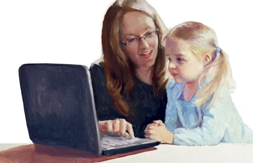 mother and daughter at computer