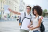 couple with a map and pointing directions