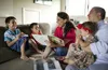 family reading from book