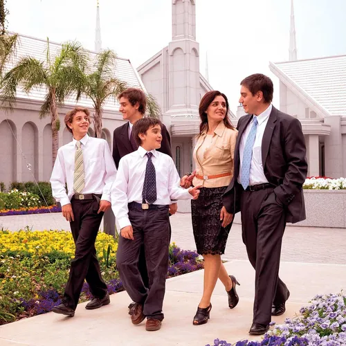 family walking in front of a temple