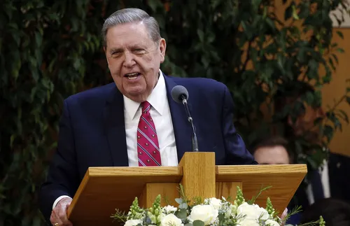 Elder Jeffrey R. Holland speaking at a pulpit