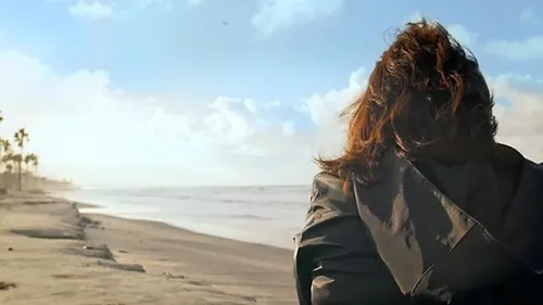 woman standing on beach
