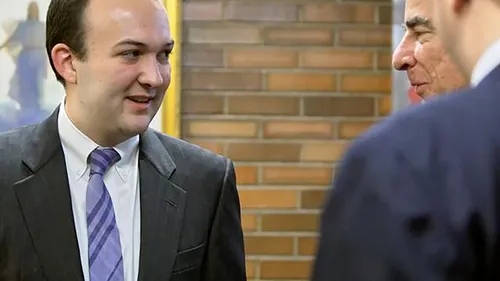 Andy talking to Robin