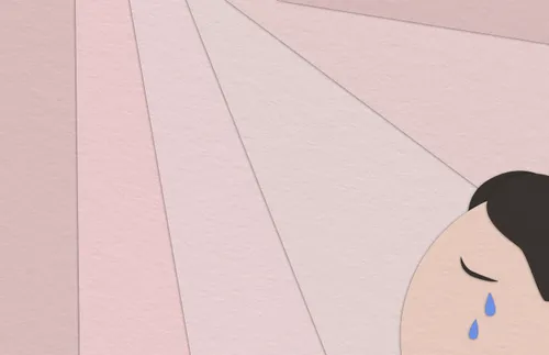 face of young woman with tears