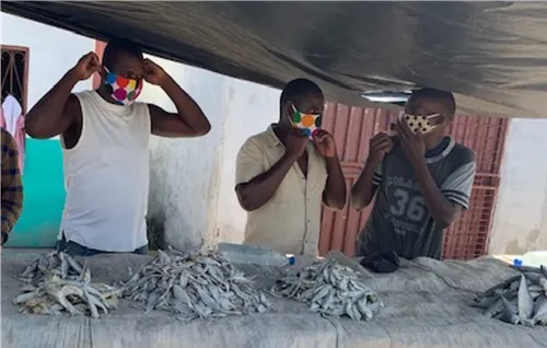 men sorting fish