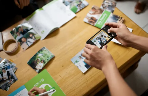 a group of people working on family history