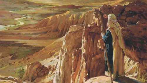 Moses looking at the promised land from a mountaintop