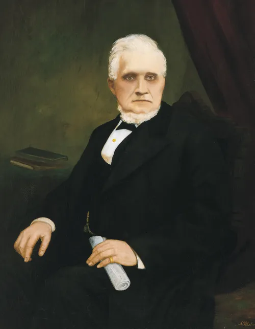 A portrait painting by A. Westwood of President John Taylor wearing a black suit and sitting in a chair.