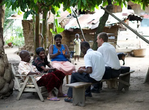 missionaries teaching a family
