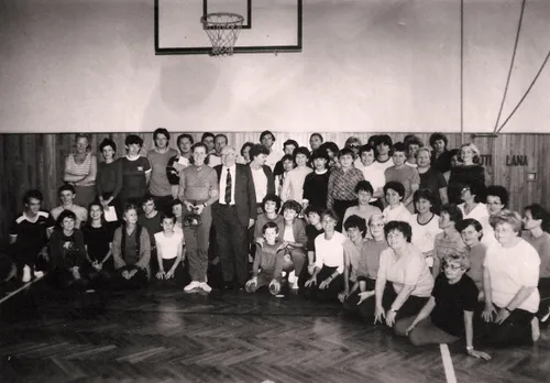 Church members standing in gymnasium