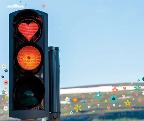 Traffic light with a heart-shaped red light