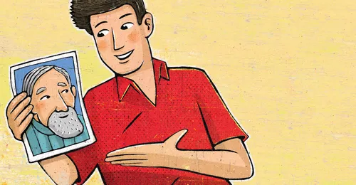 young man with picture of grandfather