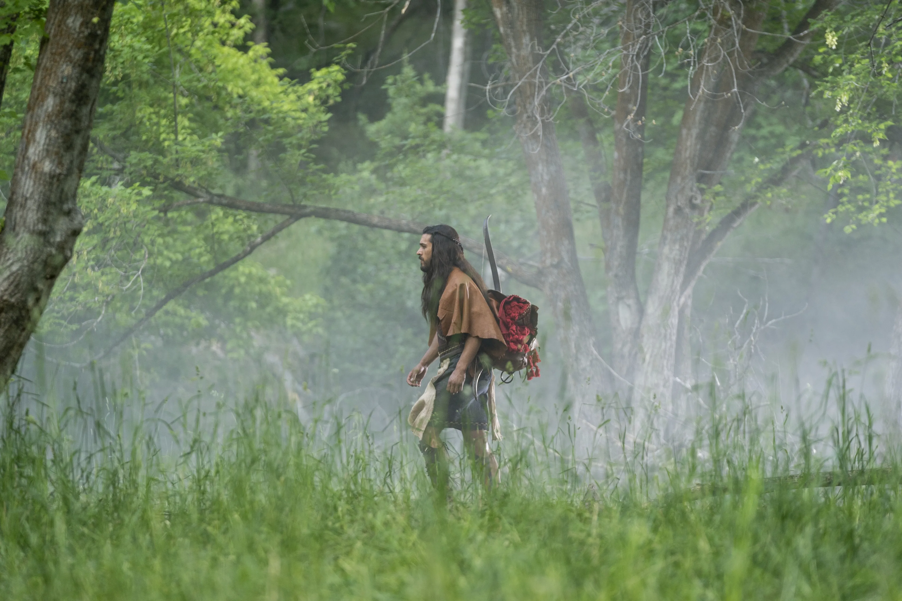 Enos hunts in the forest.