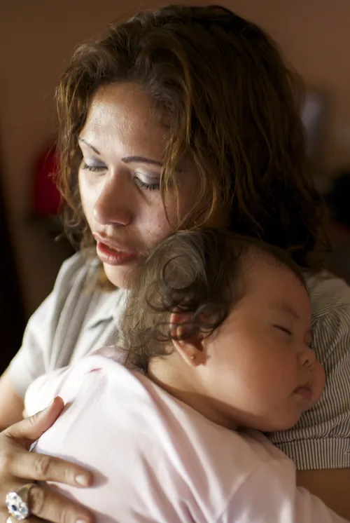 mother holding child