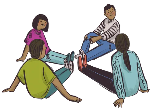 Four people sitting in circle with feet out